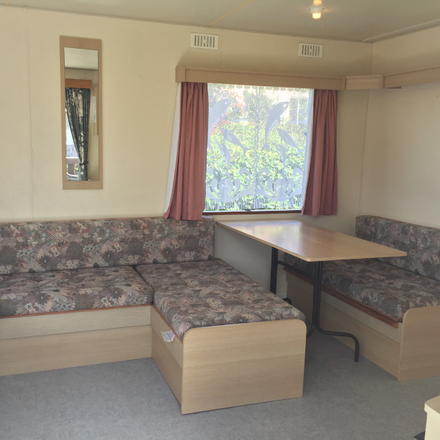 Intérieur du Mobil-home Béatrice en location au camping Le Clos Normand en Normandie